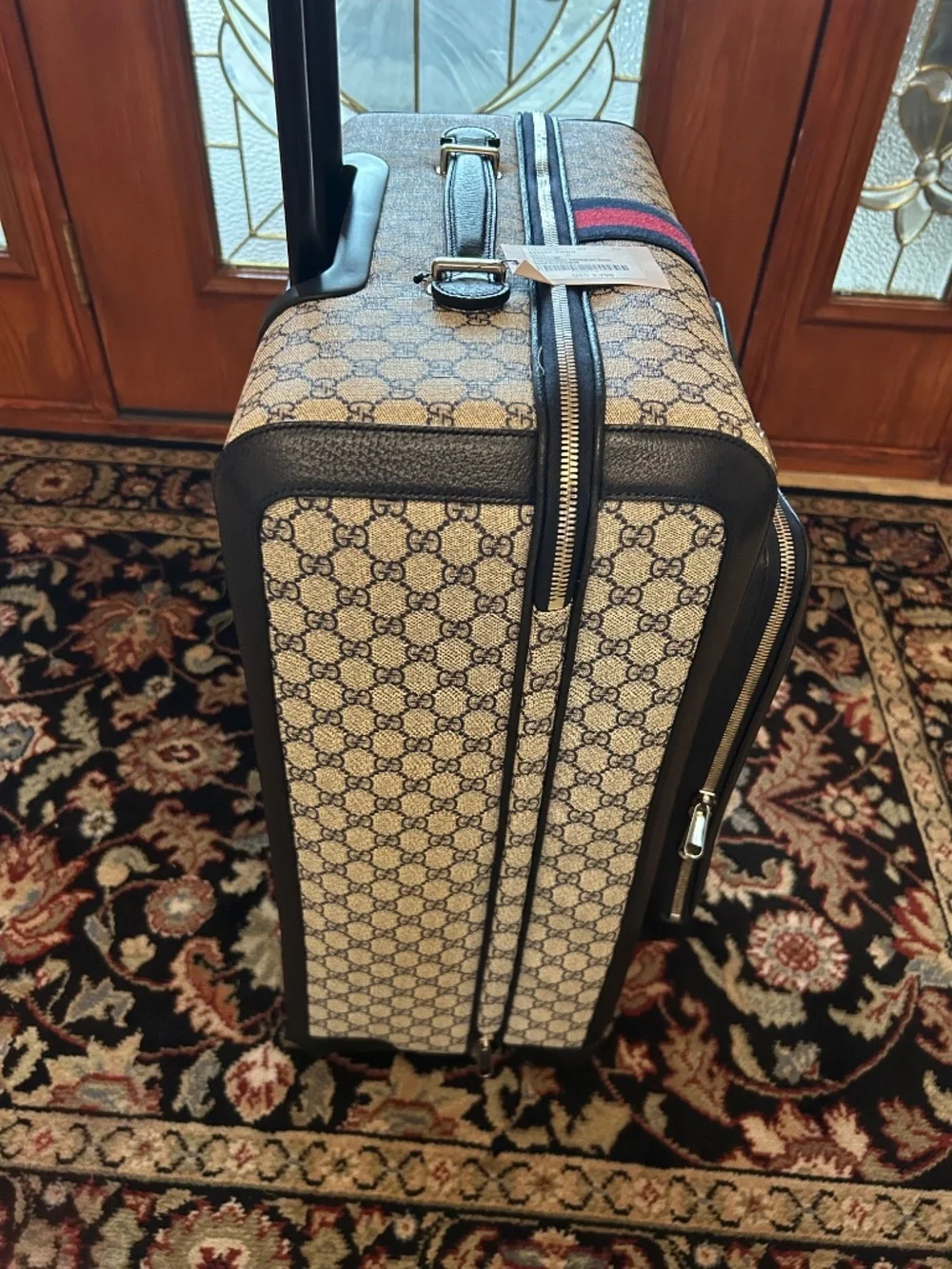 Gucci Savoy GG Supreme Suitcase. Made in Italy.